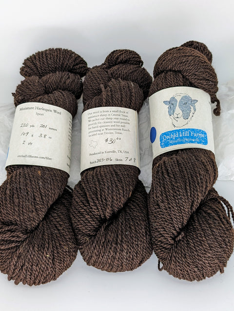 Yarn Batch 2023-016 is a Sport weight blend of Miniature Harlequin wool.