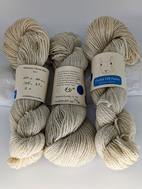 Yarn Batch 2023-007 is a Sport weight blend of Miniature Harlequin and Miniature Cheviot wool.